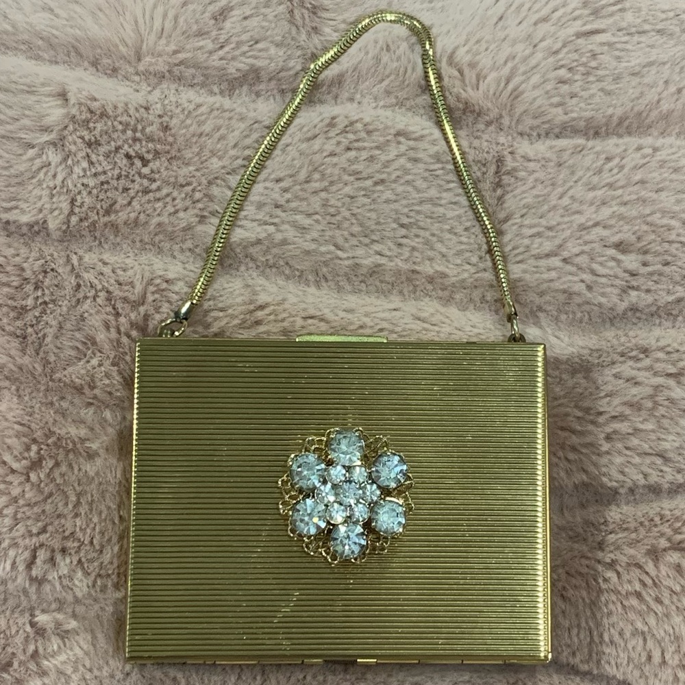 Antique Metal Clutch/Music Box/Cigarette Holder w/Lipstick, Comb, and Powder